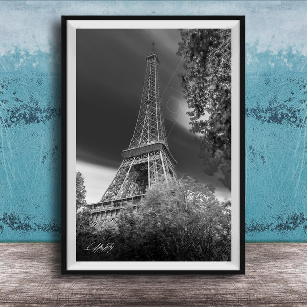 A black and white photograph of the Eiffel Tower in Paris, France, with a blue and white background.