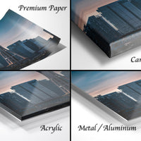 The image is a collage of four different views of a city skyline at sunset, with the cityscape appearing in various materials such as paper, canvas wrap, acrylic, and metal/aluminum.
