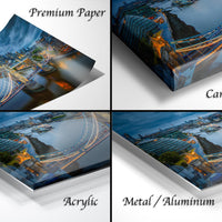 The image is a collage of four different views of a cityscape, including a close-up of a bridge, a city skyline, and a cityscape with a river. The collage is labeled as "Premium Paper", "Canvas Wrap", "Acrylic", and "Metal/Aluminum".