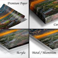 four different views of a sunset over a city, each presented in a different format: a printed paper, a canvas wrap, an acrylic print, and a metal/aluminum print.