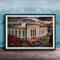 A framed photograph of Yankee Stadium, a baseball stadium in New York City, with the iconic Yankee Stadium sign prominently displayed.