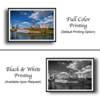 The image is a collage of two framed pictures. The top picture is a full color print of a city skyline, while the bottom picture is a black and white print of the same city skyline. Both pictures are framed and available upon request.