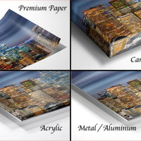 The image is a collage of four different cityscape photographs, each with a distinct style and medium. The photographs are labeled as "Premium Paper", "Canvas Wrap", "Acrylic", and "Metal/Aluminum".
