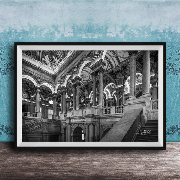 This luxury fine art photograph captures the grand interior architecture of the Library of Congress in Washington DC. Marble columns, ornate ceilings, and classical symmetry create a refined composition rooted in American national history and cultural legacy. Ideal for collectors, professionals, and interior designers seeking museum-quality wall art that embodies intellect, heritage, and timeless elegance.