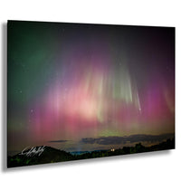 a stunning night sky filled with vibrant colors and patterns, including the mesmerizing aurora borealis or northern lights.