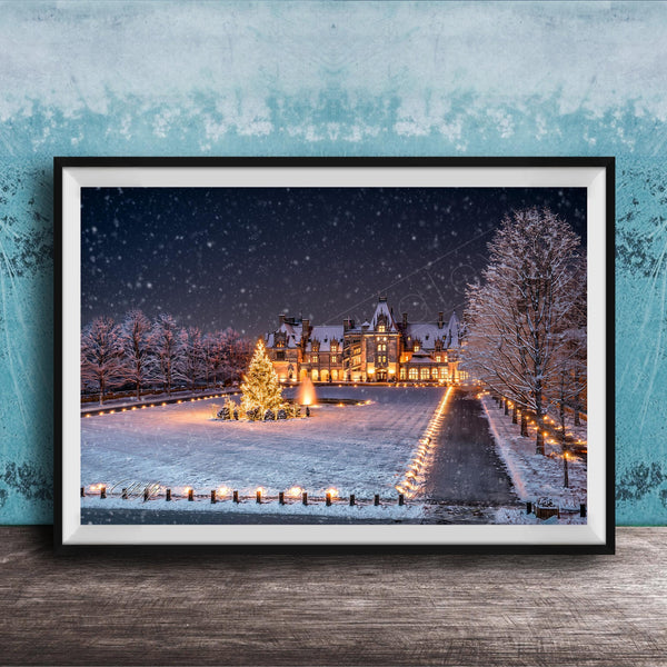 A large, illuminated Christmas tree stands in a snowy landscape, surrounded by a path of lights and a building with a pointed roof, all under a starry night sky.