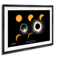 The image is a framed poster depicting the solar eclipse, showing the moon and sun in various stages of the eclipse.