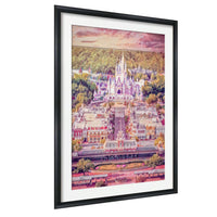 A framed image depicting a fantastical, castle-like structure surrounded by a colorful, whimsical landscape with trees, flowers, and a winding path.