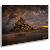 a large, multi-leveled castle or fortress situated on a hill, with a dramatic sky in the background.