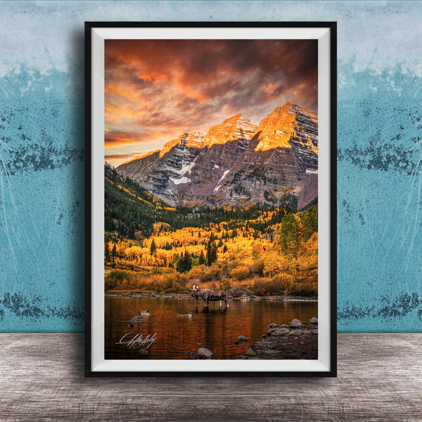 a breathtaking mountain landscape with a vibrant sunset sky, casting a warm glow over the snow-capped peaks and the surrounding forest.