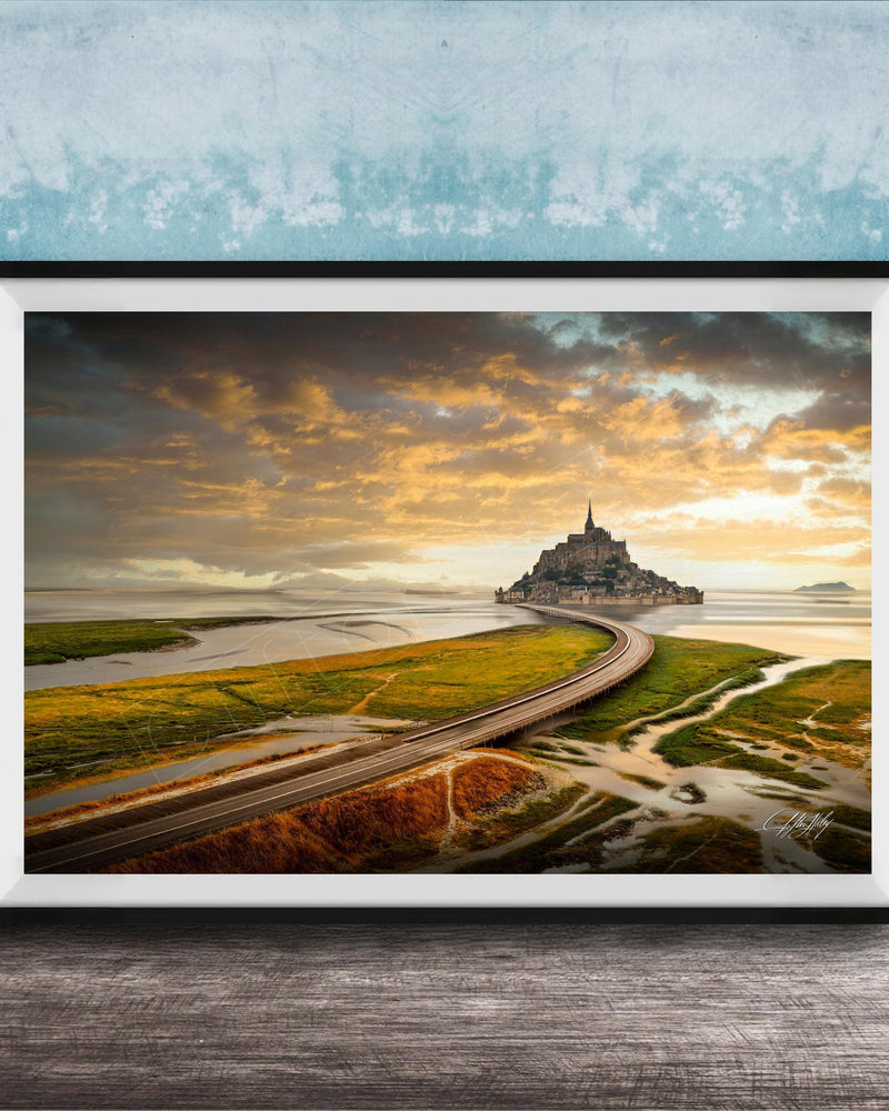 a picturesque landscape with a winding road leading to a castle on a grassy island, set against a dramatic sky with clouds and a warm, golden glow.